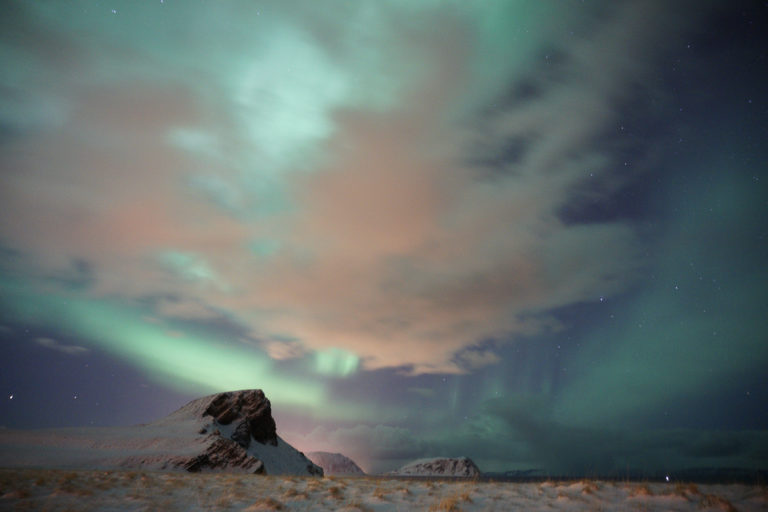 The clouds playing with the Northern Lights ©www.71-nord.no